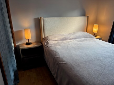 Wellfleet Cape Cod vacation rental - Queen size bed. Room has small closet, TV, dresser, AC Unit.