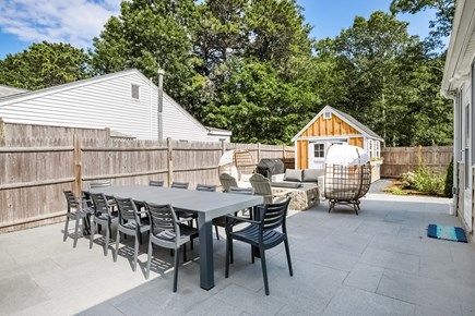 Yarmouth Cape Cod vacation rental - Large Weber gas grill, sitting area, plus 10-seat dining table