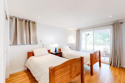 New Seabury Cape Cod vacation rental - Twin bedroom, new mattresses, sliders to back yard.