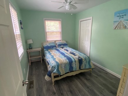 Eastham Cape Cod vacation rental - Bedroom off of the L/R with full sized bed, air conditioner, fan.