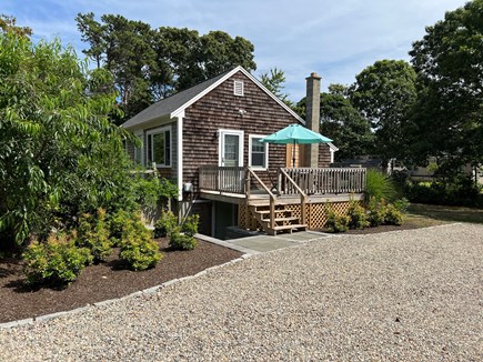 Eastham Cape Cod vacation rental - Side Deck and Driveway view.