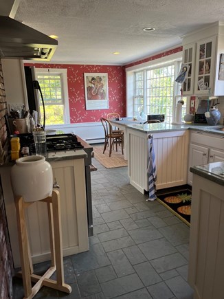 Barnstable Village Cape Cod vacation rental - Kitchen with farmer's table dining area.