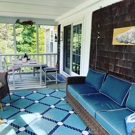 Barnstable Village Cape Cod vacation rental - Lovely screened in porch with dining area and seating.