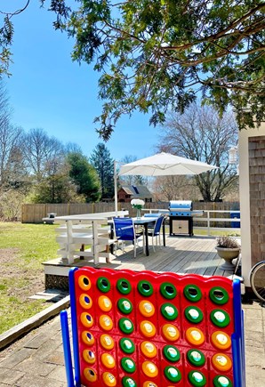 E. Falmouth Cape Cod vacation rental - Outside games, deck, table and gas grill