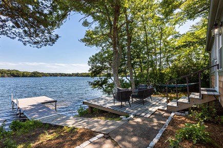 Centerville Cape Cod vacation rental - The cottage is waterfront with a private dock and deck.