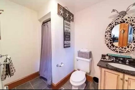 Wareham MA vacation rental - Downstairs bathroom with a stand up shower.