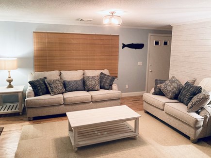 West Yarmouth Cape Cod vacation rental - Updated living room with two comfortable couches, large TV
