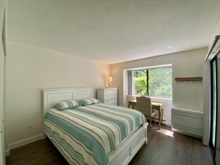Ocean Edge Cape Cod vacation rental - Primary Bedroom with Access to the Patio