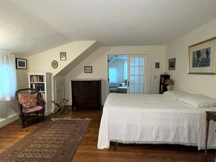 Harwich Port Cape Cod vacation rental - Master bedroom with queen size bed, French doors to sitting area.