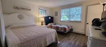 East Falmouth Cape Cod vacation rental - First floor bedroom with a queen bed and one twin bed