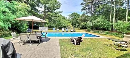 East Falmouth Cape Cod vacation rental - Back yard with pool, deck and patio