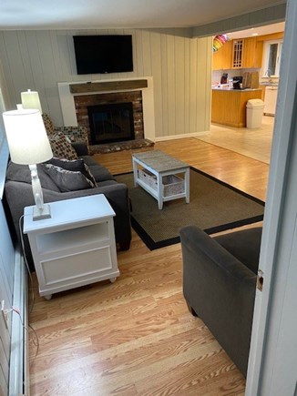 East Falmouth Cape Cod vacation rental - Living room open to kitchen and dining area