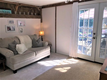 East Orleans Cape Cod vacation rental - Bedroom three with cozy nook looking out on rear patio.