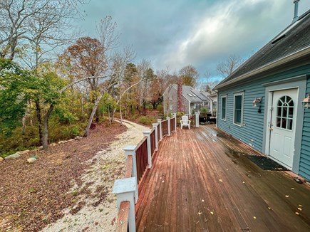 EASTHAM Cape Cod vacation rental - Front deck and front yard on a cloudy autumn day