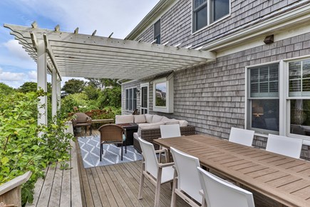 Orleans Cape Cod vacation rental - Back Deck Sitting Area w/ Plenty of Seating & Firepit