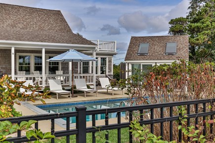 Orleans Cape Cod vacation rental - Lazy pool days made easy with this outdoor layout