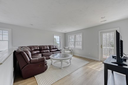 New Seabury Cape Cod vacation rental - Upstairs loft area / family room. Water views from windows & deck