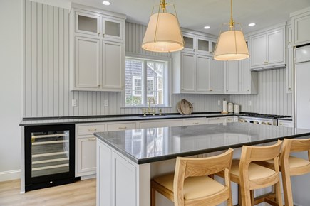 New Seabury Cape Cod vacation rental - Remodeled kitchen. Cabinet panel will go on refrigerator