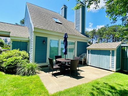 Ocean Edge, Brewster Cape Cod vacation rental - Patio with Seating for 4, Umbrella, Gas Grill, Plus Extra Chairs