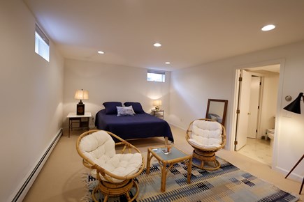 Chatham Cape Cod vacation rental - Lower Queen Bedroom Area with Seating, ensuite Bath and Laundry