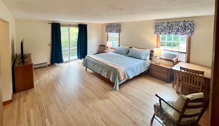 North Eastham Cape Cod vacation rental - First floor bedroom with a king bed and low entry shower bathroom