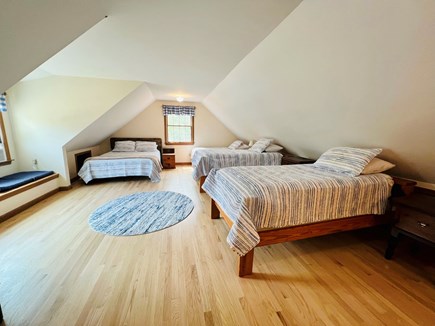 North Eastham Cape Cod vacation rental - Large bedroom with a queen bed and 3 twins
