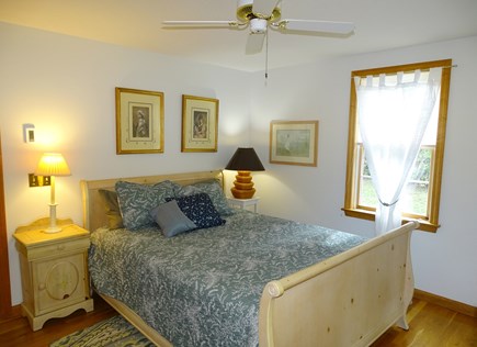 North Eastham Cape Cod vacation rental - Main floor queen bedroom with ceiling fan, dresser