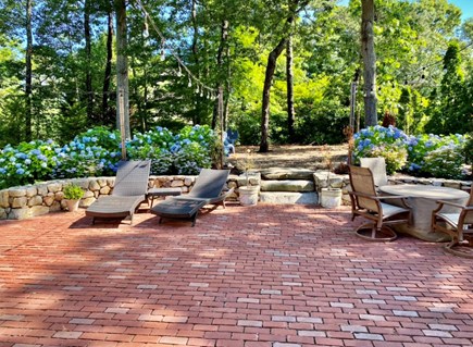 Brewster Cape Cod vacation rental - Patio with gas fire pit and outdoor shower