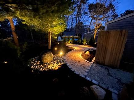 Eastham Cape Cod vacation rental - New landscape lighting with a relaxing water feature.