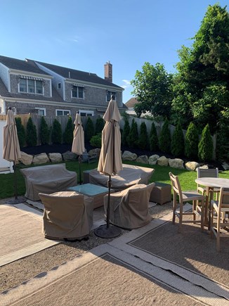 Harwich Port Cape Cod vacation rental - Outdoor sofas to sit and relax with several umbrellas for shade