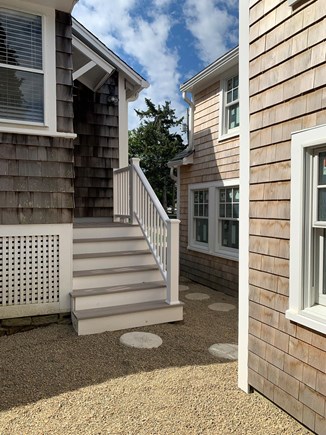 Harwich Port Cape Cod vacation rental - Back stairs of main house is close to back door of guest house