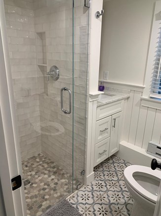 Harwich Port Cape Cod vacation rental - One of two full bathrooms inside guest house.