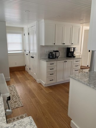 Harwich Port Cape Cod vacation rental - Kitchen has a stackable washer and dryer in closet
