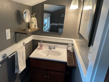 Hyannis Cape Cod vacation rental - Master bedroom half bath sink