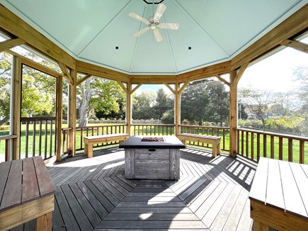 Orleans, Rock Harbor Cape Cod vacation rental - Screened in gazebo with an easy-to-light firepit for fun at night
