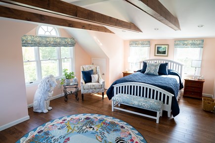 Orleans, Rock Harbor Cape Cod vacation rental - Queen bedroom with sitting area, bath, and separate office space