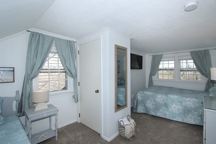 Dennis Cape Cod vacation rental - Bedroom with twin beds and mounted t.v.