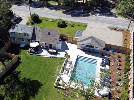 Dennis Cape Cod vacation rental - Aerial of backyard & pool