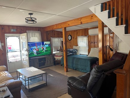 Harwich Cape Cod vacation rental - Main living area with 65” Smart TV for family entertsinment