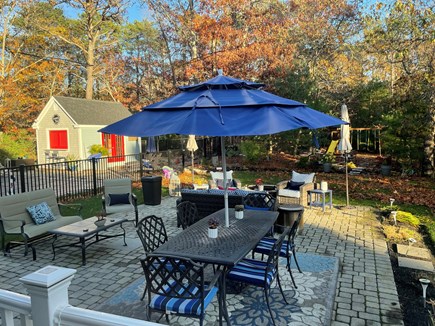 Sandwich Cape Cod vacation rental - Patio with 2 sitting areas, dining table, chairs, umbrellas and f