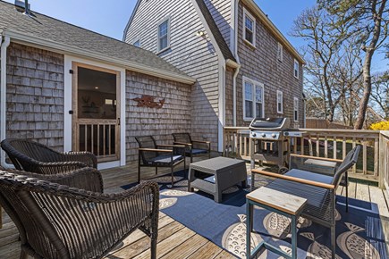 Harwichport Cape Cod vacation rental - Backyard deck with gas grill