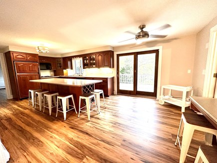 East Falmouth, MA Cape Cod vacation rental - Expansive kitchen w sliders to massive deck overlooking the water