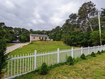 Harwich Cape Cod vacation rental - Large fenced in front yard for lots of playing!