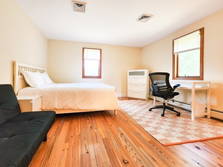 Falmouth Cape Cod vacation rental - Uper level bedroom 1, queen bed, futon, and desk