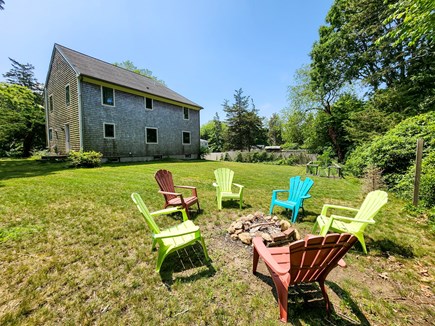 Falmouth Cape Cod vacation rental - Firepit area in spacious, private green back yard