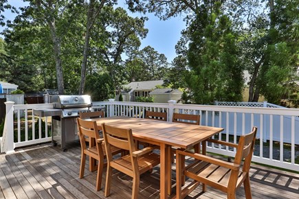 West Dennis Cape Cod vacation rental - Large deck with new Weber grill and outdoor dining