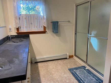 West Harwich Cape Cod vacation rental - Bathroom off of primary bedroom offers shower and double sinks.