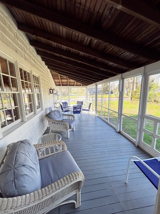 Orleans Rock Harbor Cape Cod vacation rental - A screened-in porch for outside enjoyment.