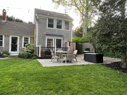 Wellfleet Village Cape Cod vacation rental - Patio with furniture, gas grill, deck & enclosed outdoor shower