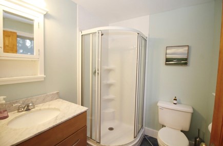 Wellfleet Village Cape Cod vacation rental - First floor bathroom with shower in rear of house
